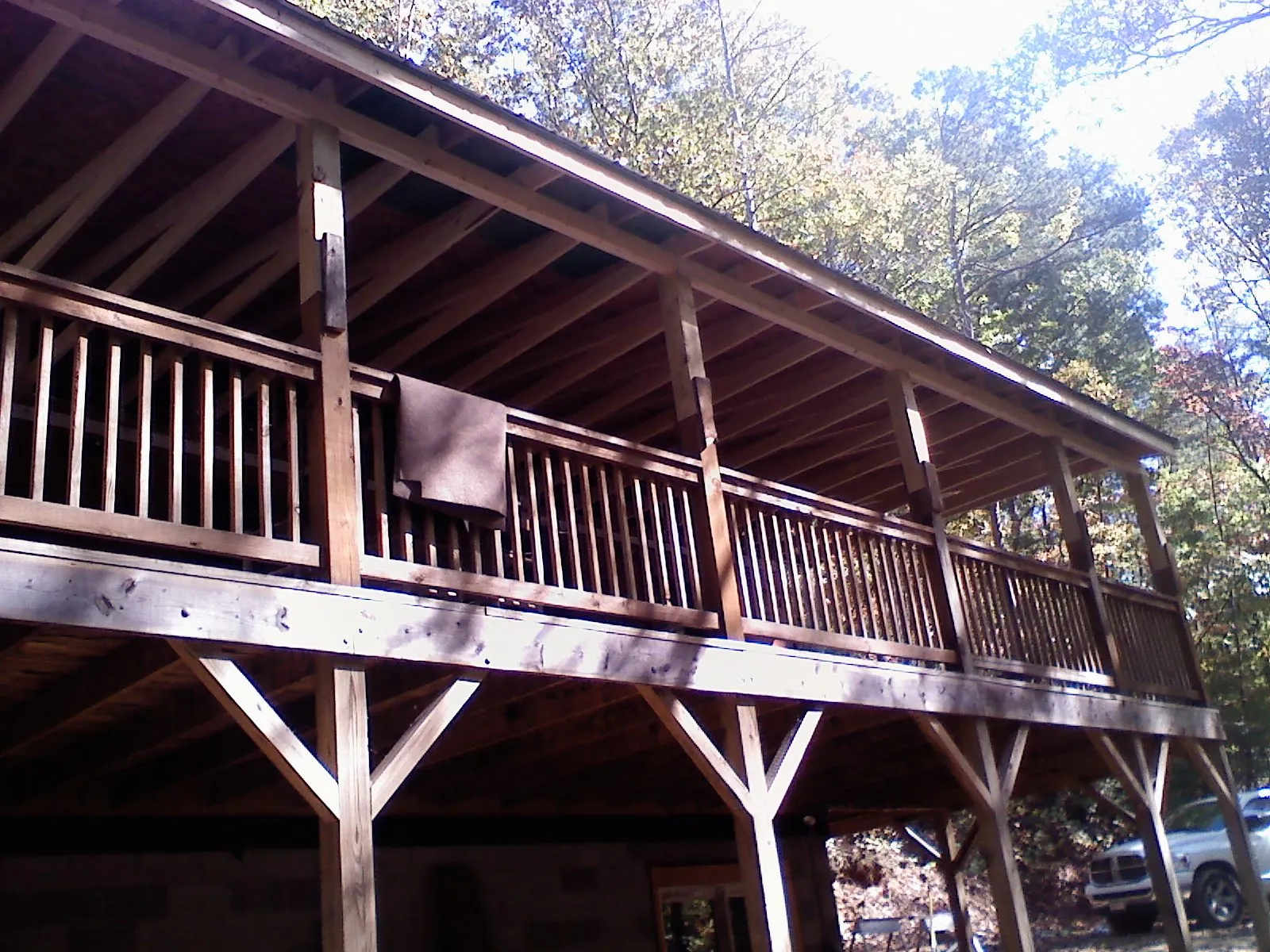 Timber framing under a new elevated porch and deck — Roof Leak Repair in New Baltimore by Roofing Brothers